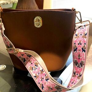 Obstante tan leather bucket bag